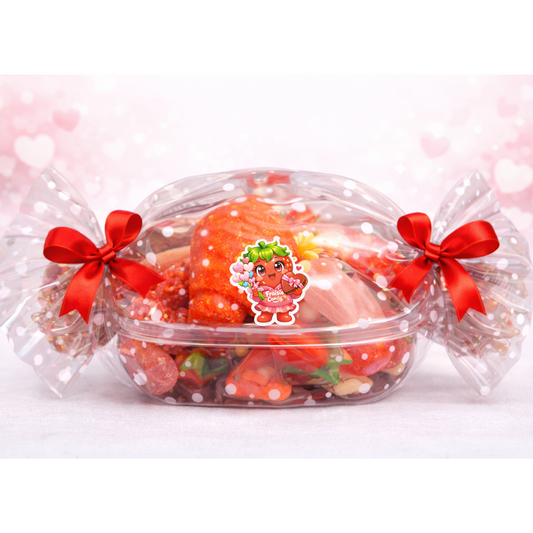 Bonbonnière translucide en forme de bonbon remplie de friandises Saint-Valentin